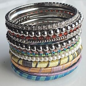 13 bangle bracelets. Assorted metal, stones, beads and fabric